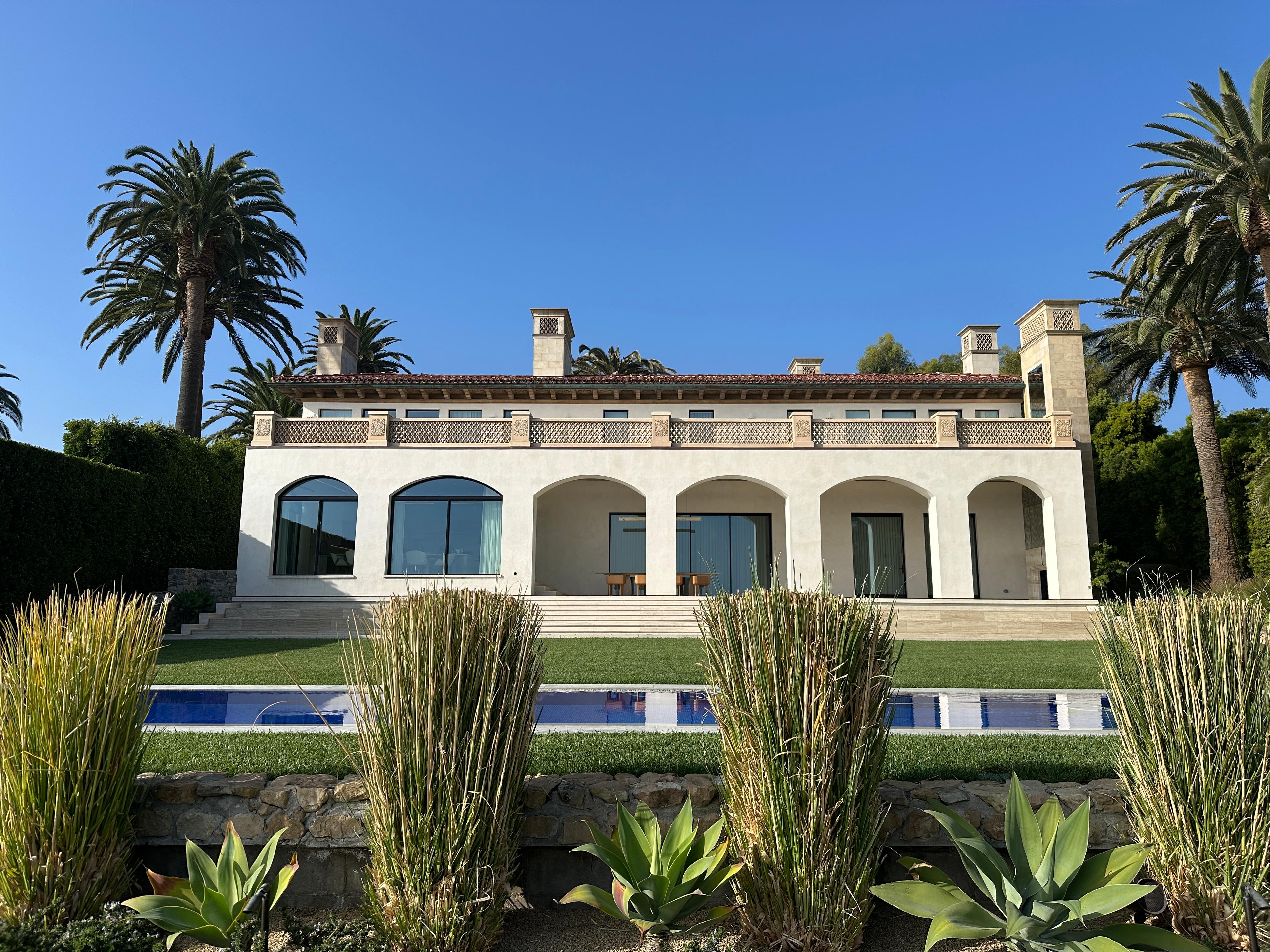 Completed Los Angeles luxury home with a pool and landscaped grounds